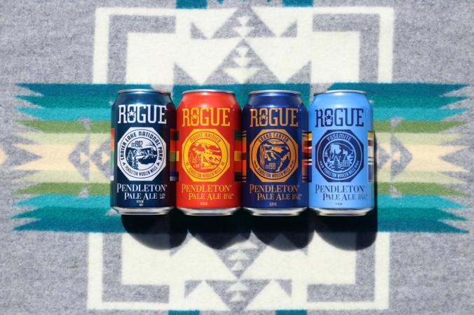 Four cans of Rogue IPA on a Pendleton Chief Joseph blanket